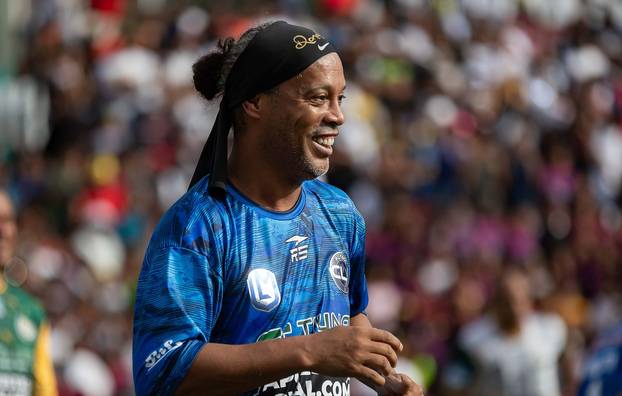 Ronaldinho leads soccer exhibition match in Venezuela's largest slum