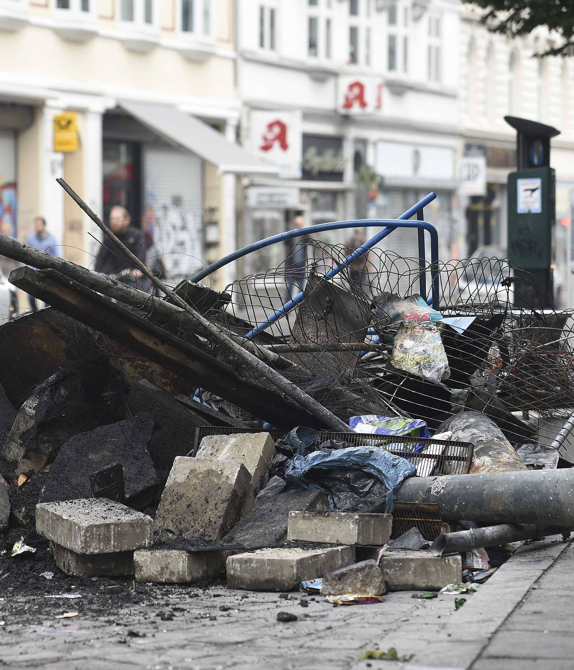 Damages are seen on a street after demonstrations at the G20 summit in Hamburg