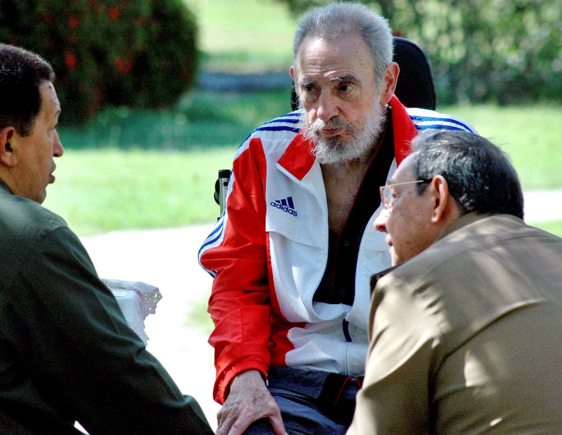 File photo of former Cuban President Fidel Castro listening during a meeting with his brother Cuban President Raul Castro and Venezuela's President Hugo Chavez in Havana