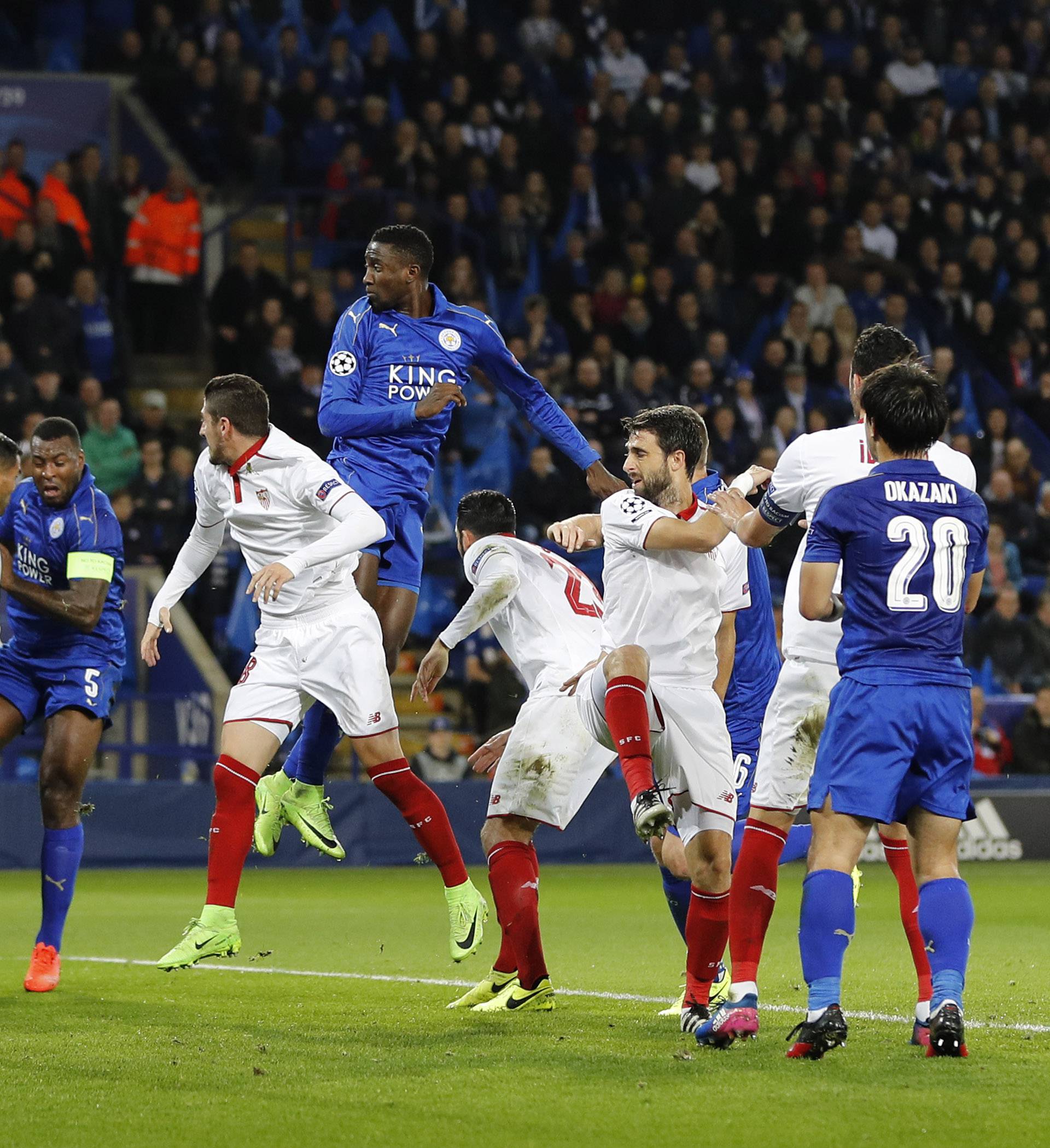 Leicester City's Wes Morgan scores their first goal