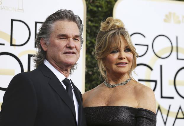 Goldie Hawn and Kurt Russell arrive at the 74th Annual Golden Globe Awards in Beverly Hills