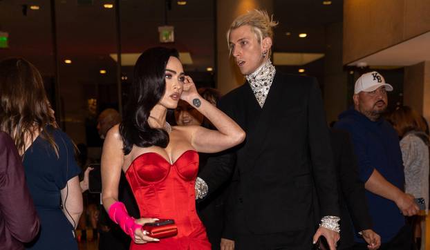 Machine Gun Kelly and Megan Fox arrive at Clive Davis' famed Grammy Party in Beverly Hills