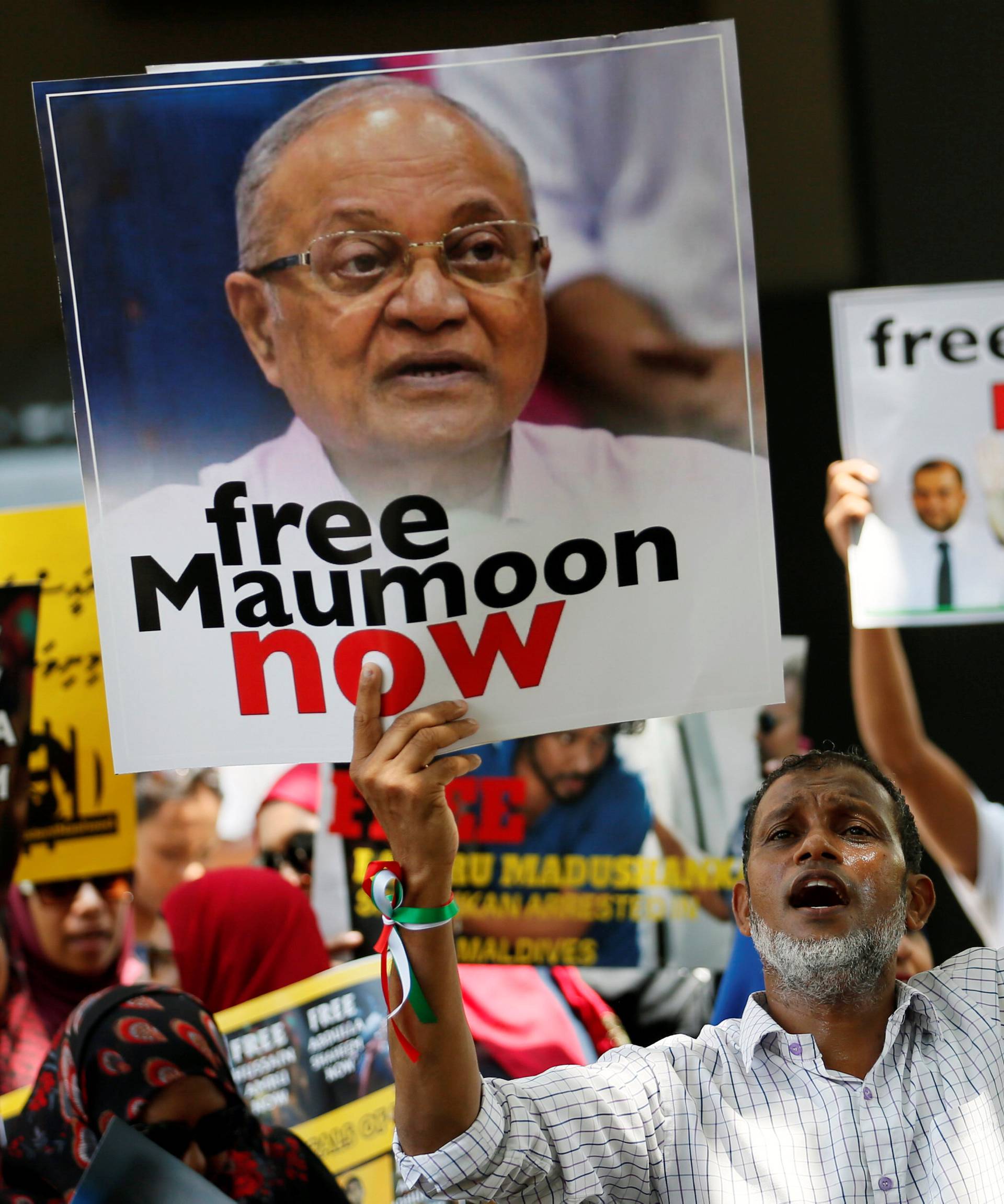 A supporter of former Maldivian president Mohamed Nasheed shouts slogans during a protest against the current president of the Maldives Abdulla Yameen, demanding the release of opposition political prisoners in front of the Maldives embassy in Colombo