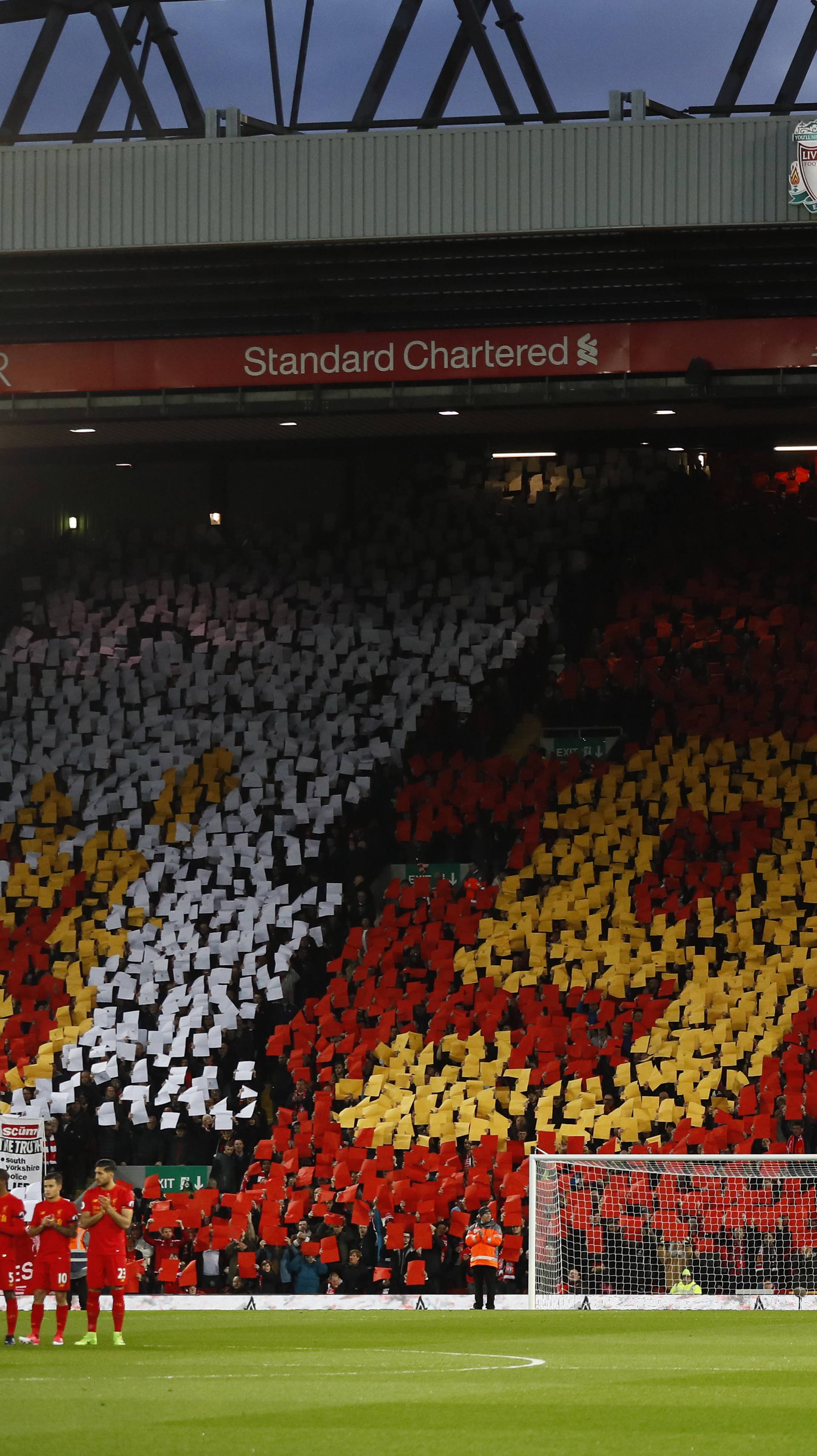 General view of players and fans during a minutes applause in memory of the Hillsborough disaster victims