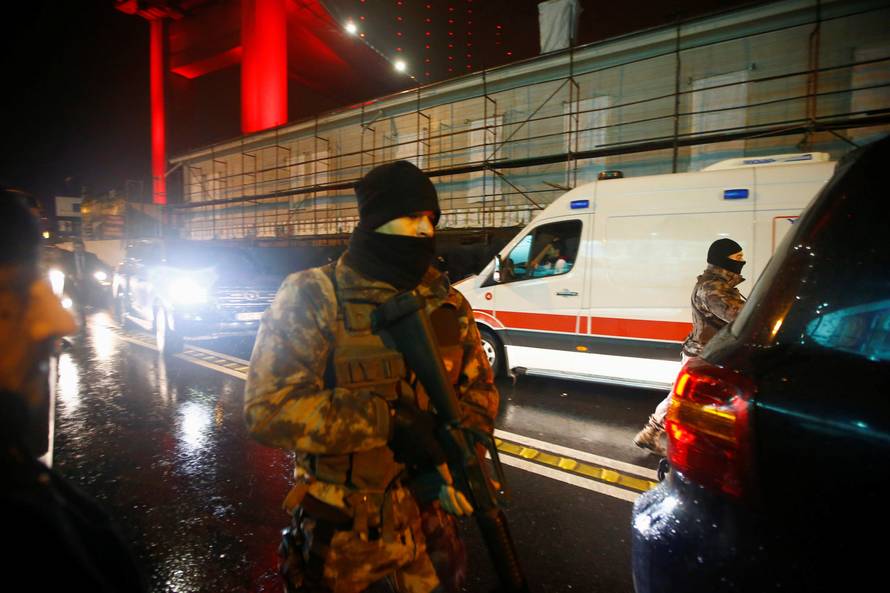 Police secure an area near an Istanbul nightclub, following a gun attack