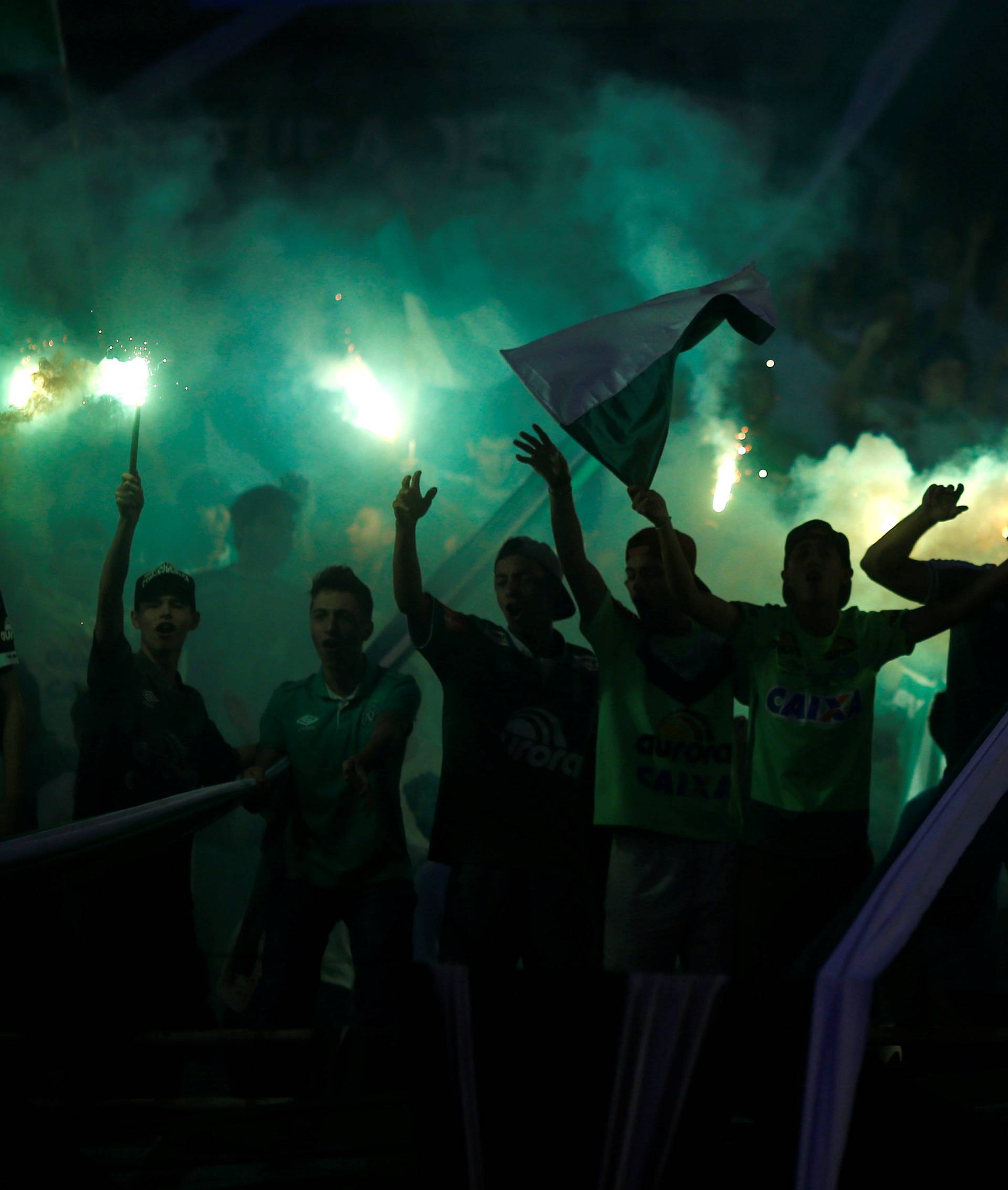 Fans of Chapecoense soccer team pay tribute to Chapecoense's players at the Arena Conda stadium in Chapeco