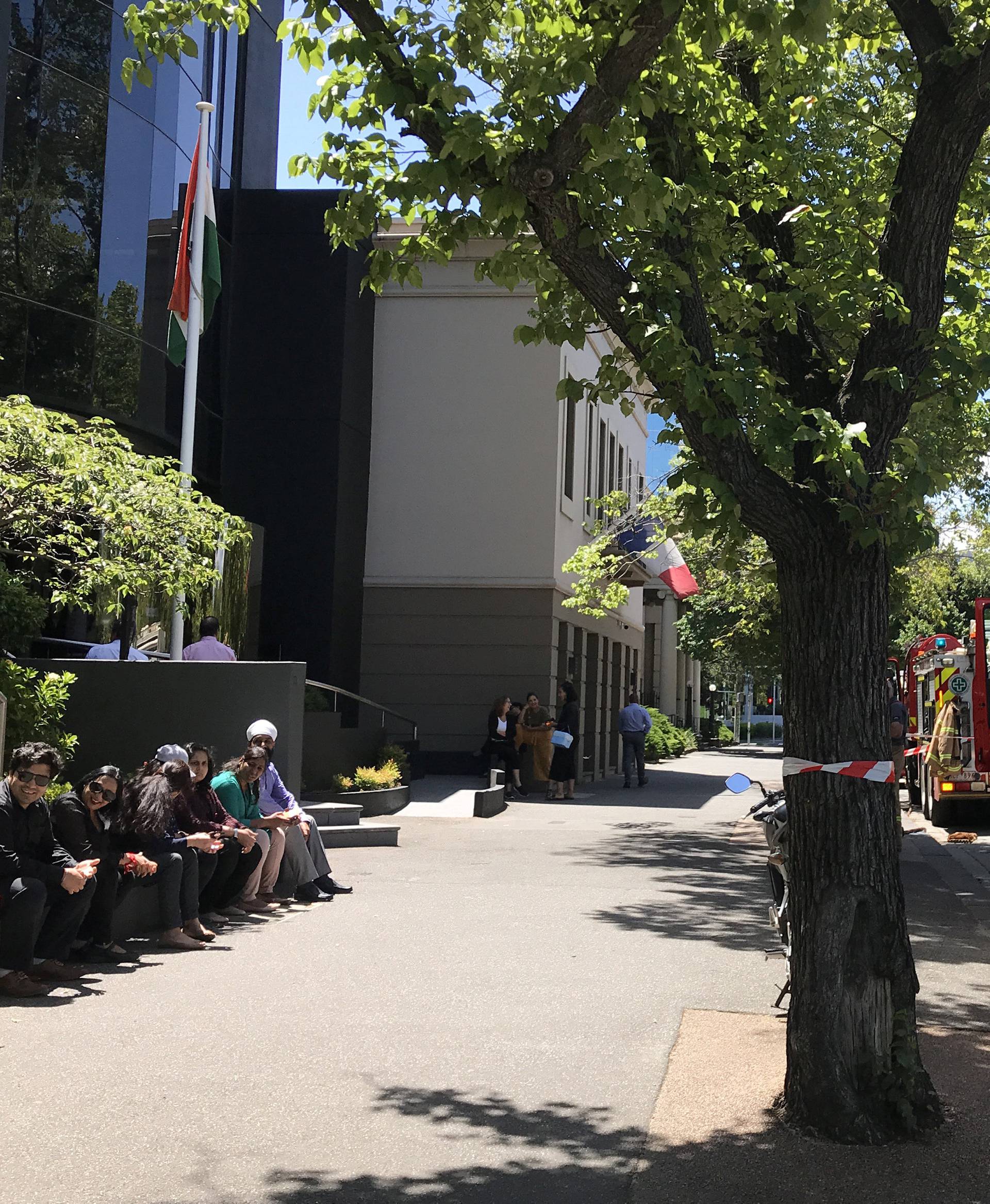 Fire crews are seen outside the Indian Consulate on St Kilda Road in Melbourne