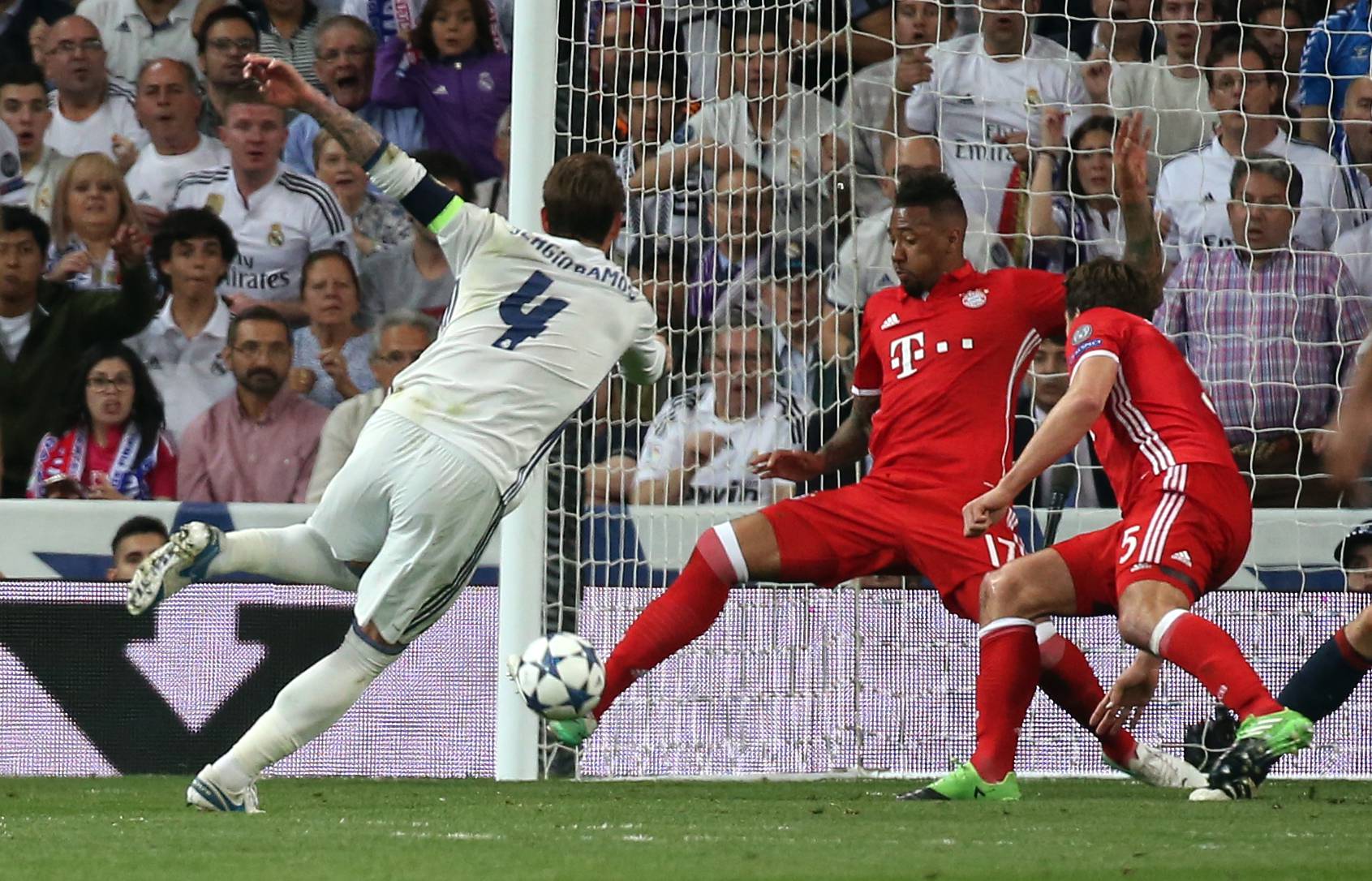 Real Madrid's Sergio Ramos has his shot cleared off the line by Bayern Munich's Jerome Boateng