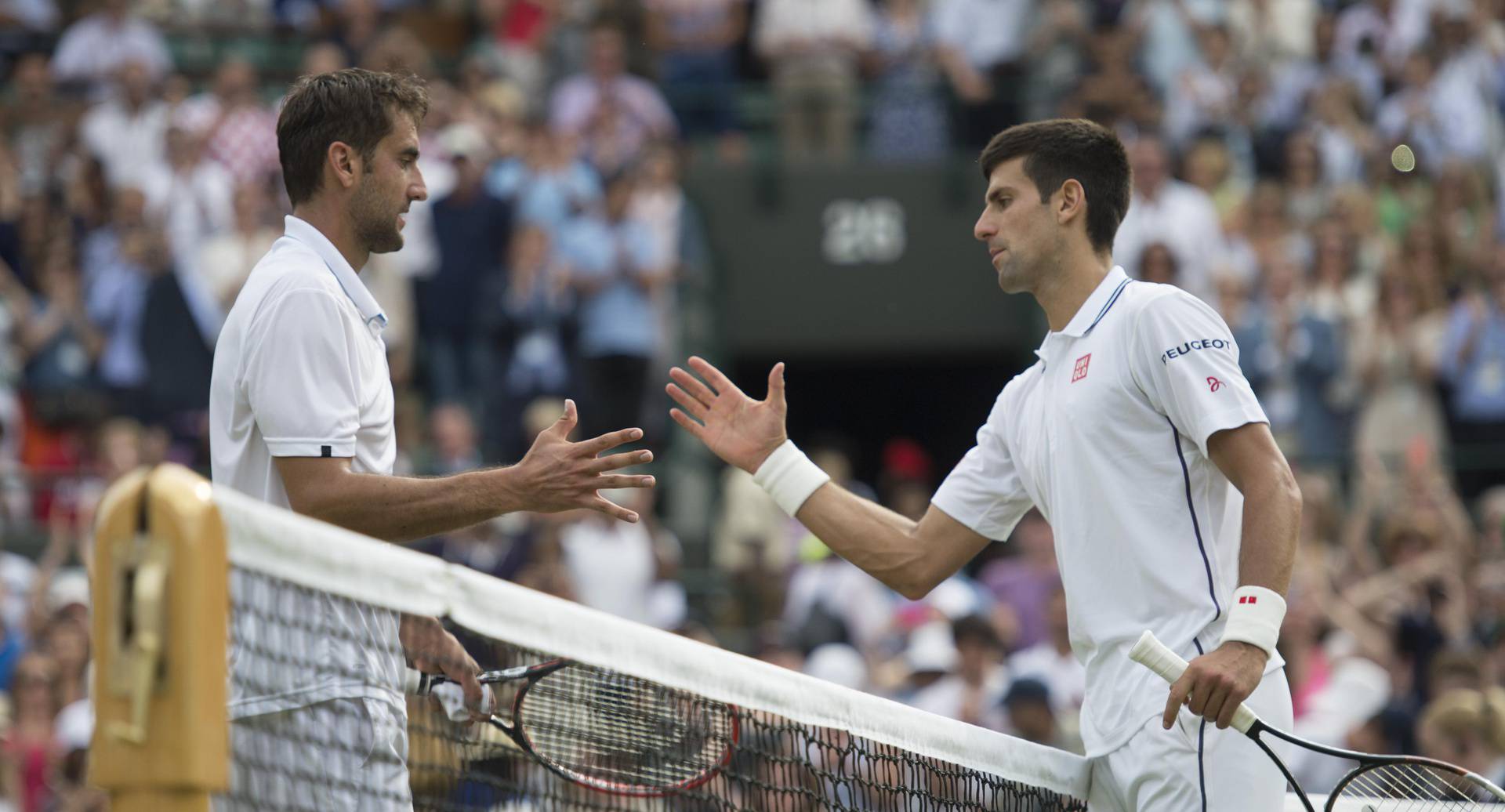 Wimbledon Day 9. Novak Djokovic (SER) wins his match against Marin Cilic (CRO).