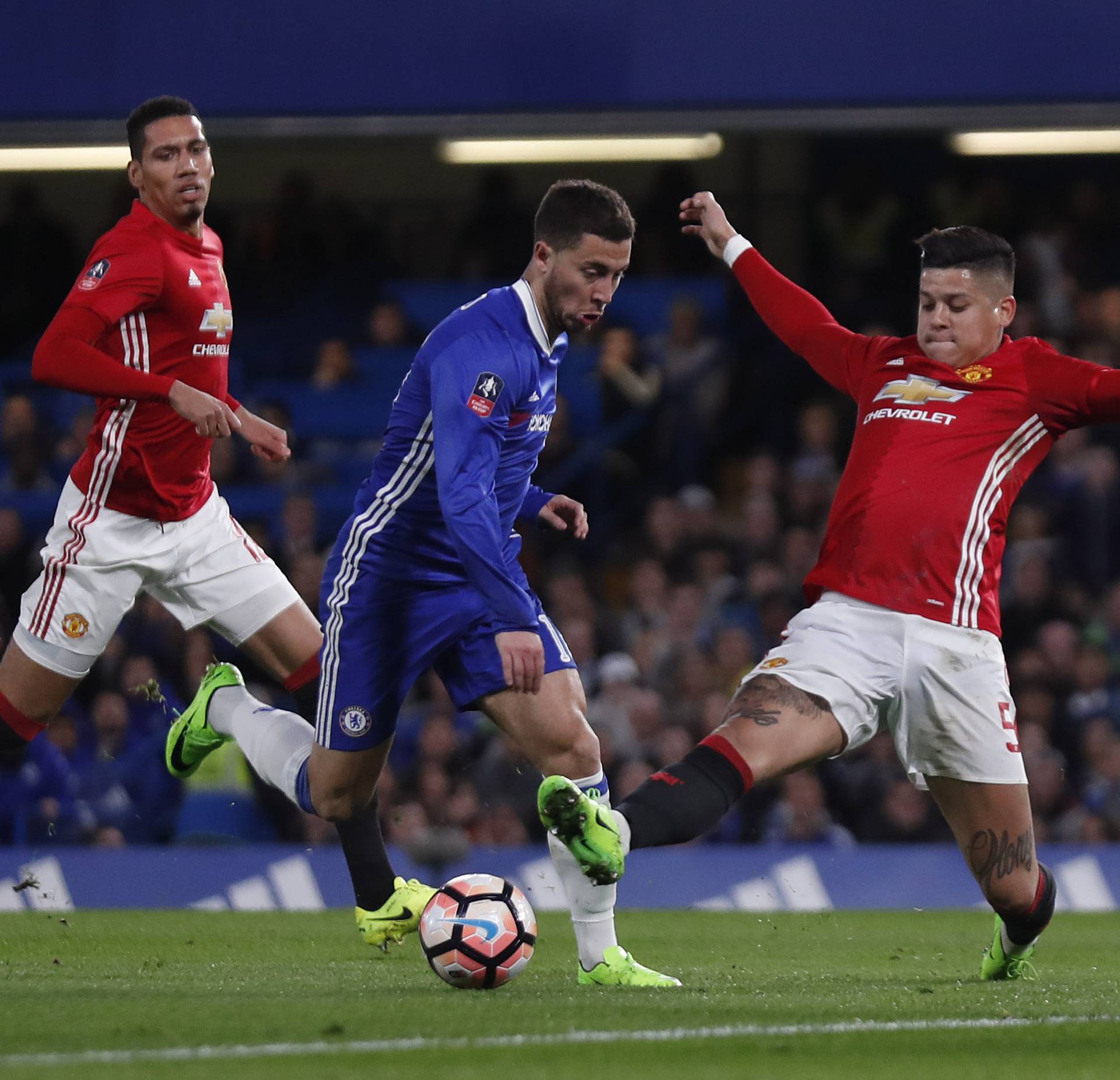 Chelsea's Eden Hazard in action with Manchester United's Marcos Rojo