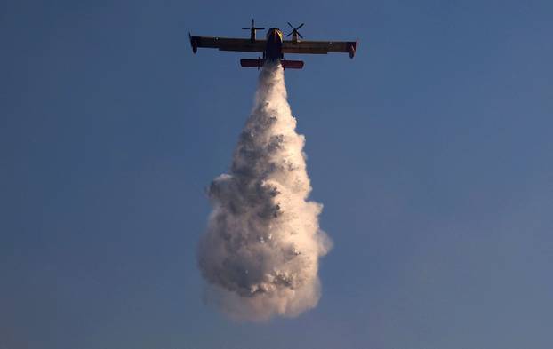 Wildfire burns near the village of Liti