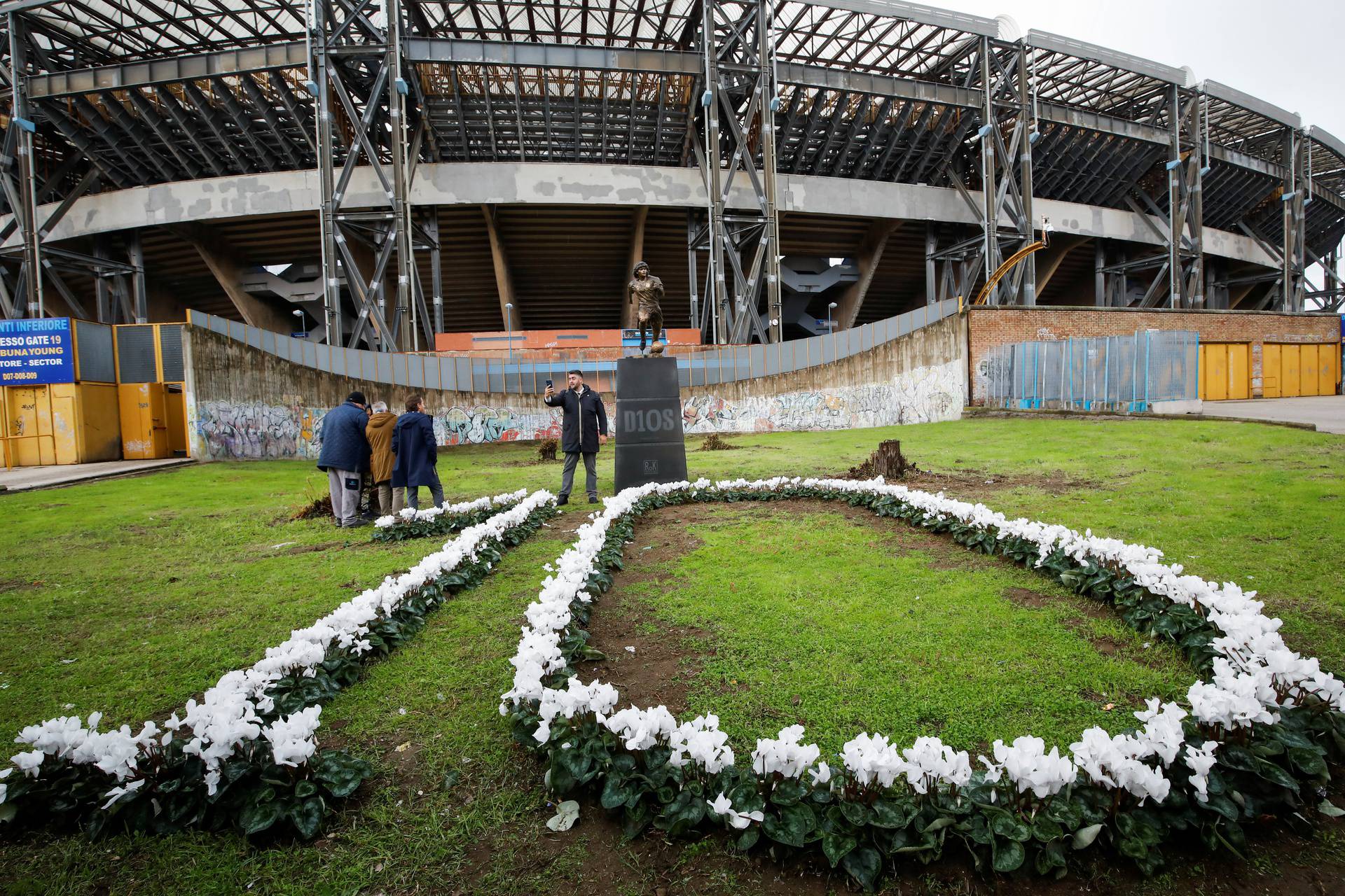 A statue of Argentinean soccer legend, Diego Armando Maradona, is unveiled in Naples