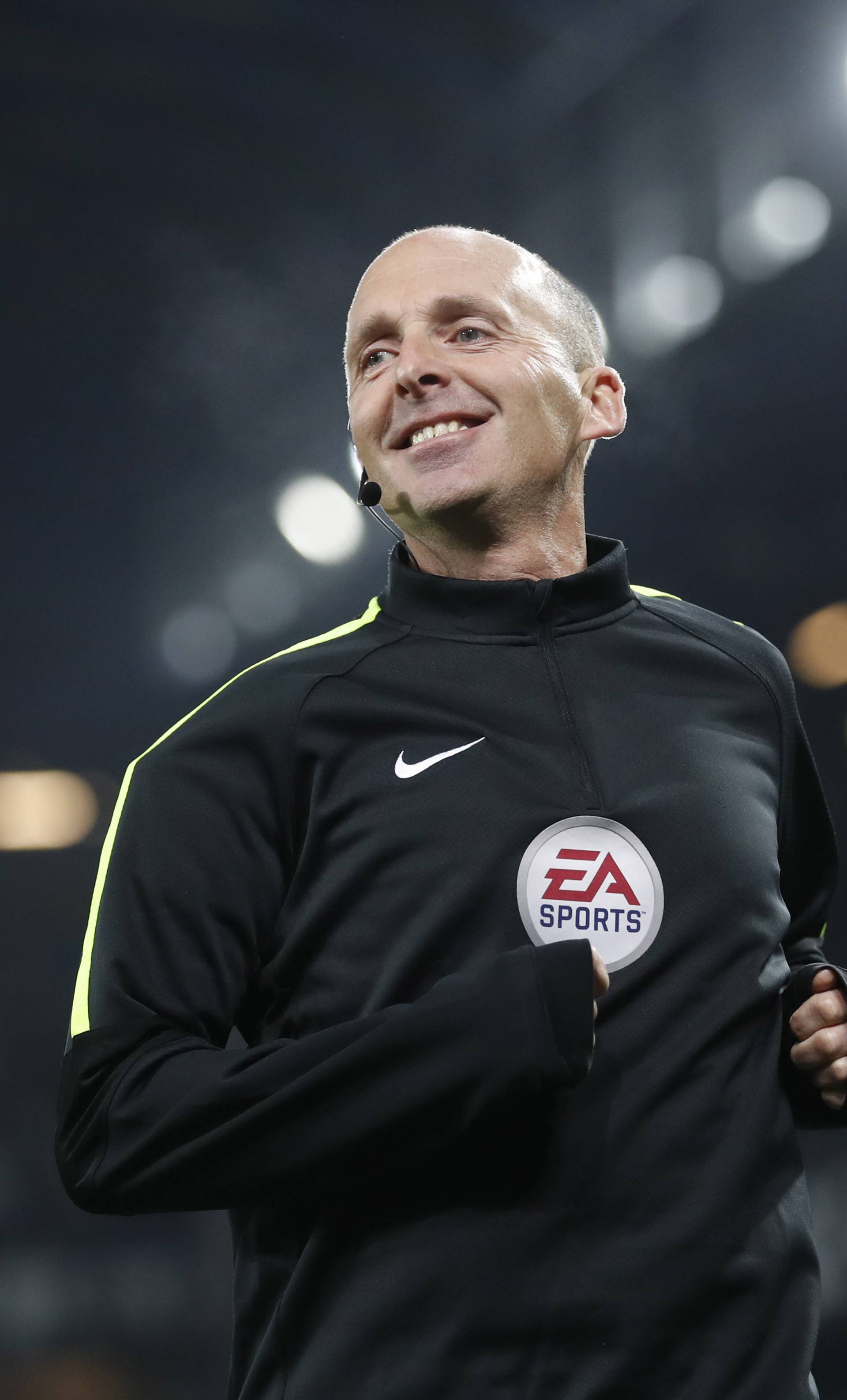 Referee Mike Dean during the warm up before the match