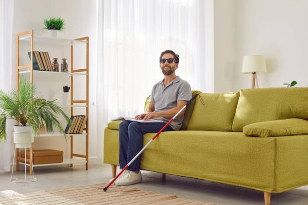 Visually,Impaired,,Blind,Man,Reads,A,Braille,Book,,Using,Touch