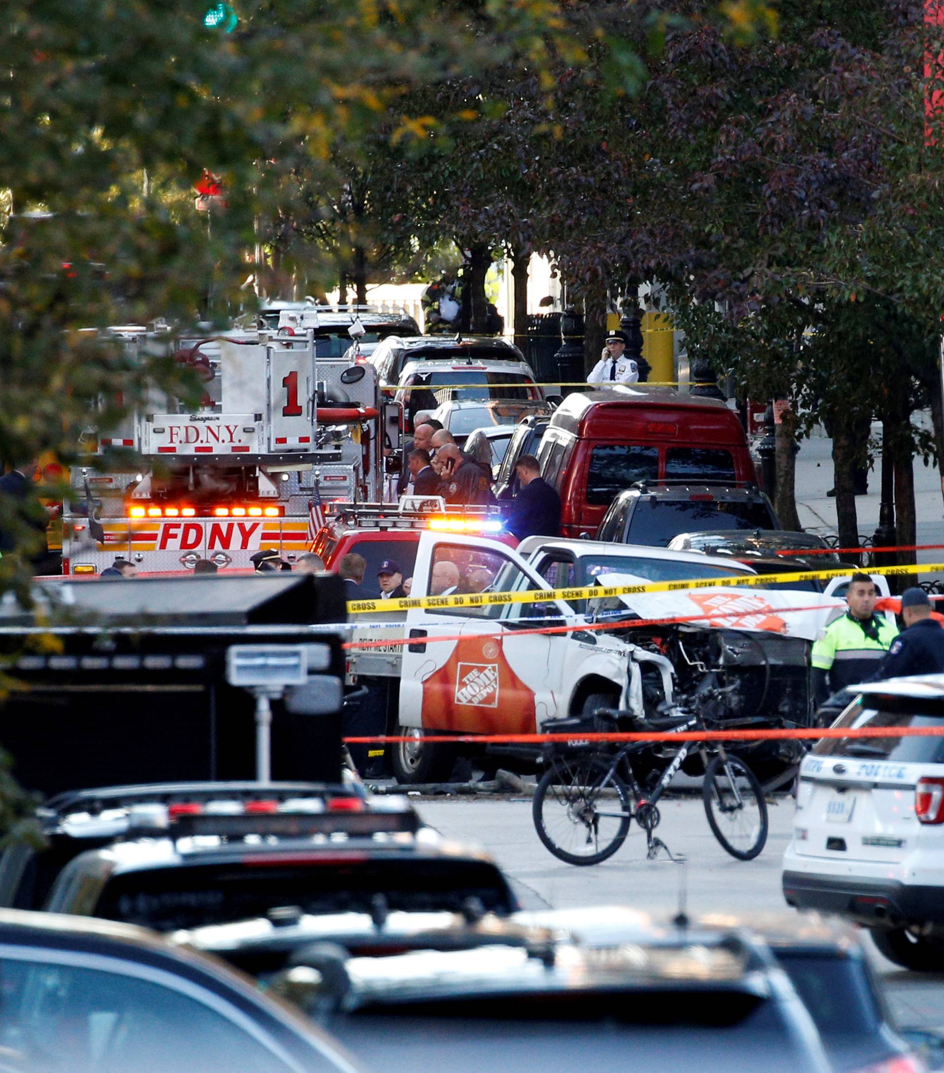 A Home Depot truck which struck down multiple people on a bike path, killing several and injuring numerous others, is seen as New York city first responders are at the crime scene in lower Manhattan in New York