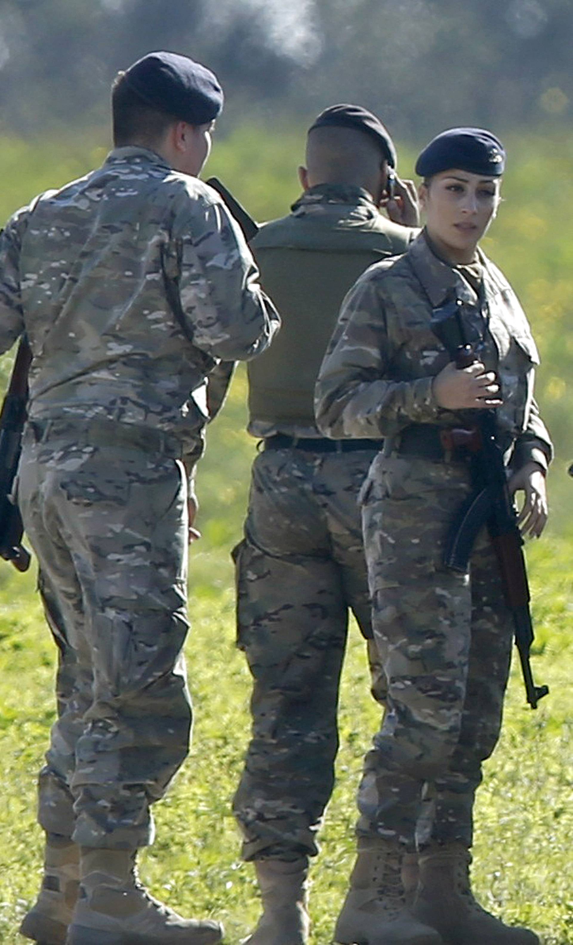 Maltese troops survey a hijacked Libyan Afriqiyah Airways Airbus A320 on the runway at Malta Airport