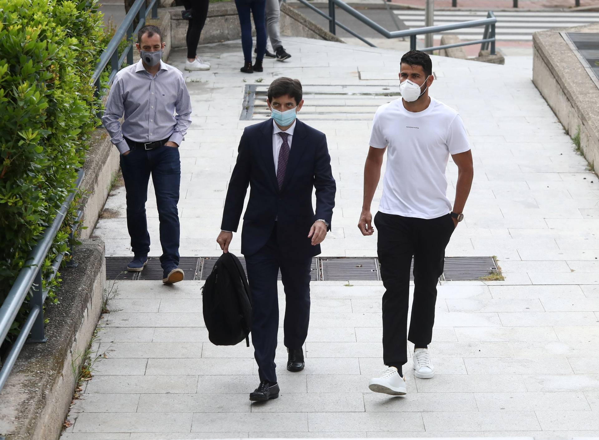 Atletico Madrid's Diego Costa arrives at a court to attend a trial for tax fraud