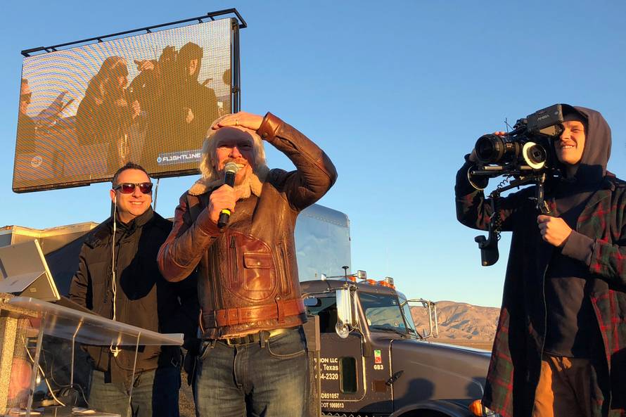 Branson addresses the crowd moments after take off of Virgin Galacticâs carrier airplane carrying a space tourism rocket plane toward space from Mojave Air and Space Port in Mojave