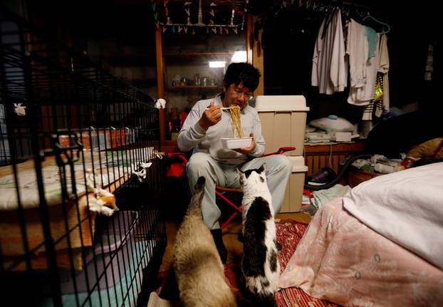 The Wider Image: The man who saves forgotten cats in Fukushima