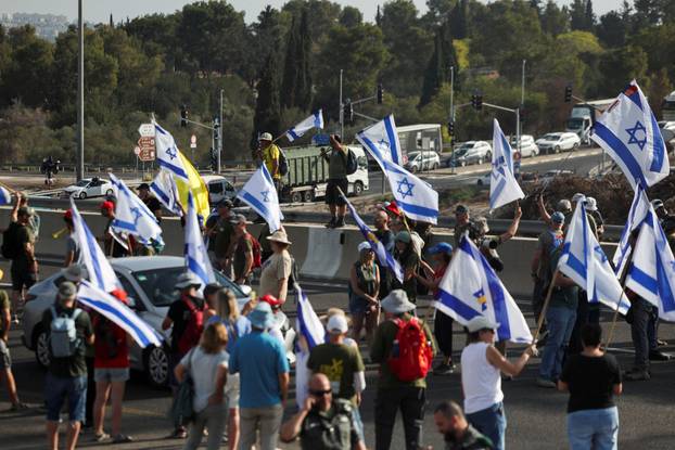 People block Israel's main highway connecting Jerusalem and Tel Aviv near Latrun