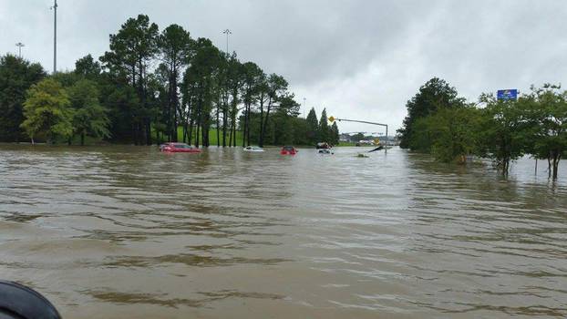 Floodwaters are seen I-12 WB on ramp in Denham Springs, Livingston Parish