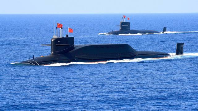 Nuclear-powered Type 094A Jin-class ballistic missile submarine of the Chinese People's Liberation Army (PLA) Navy is seen during a military display in the South China Sea