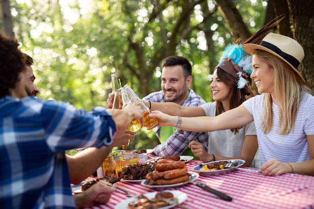 Friends,Making,Barbecue,And,Having,Lunch,In,The,Nature