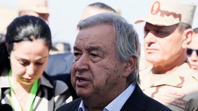 UN Secretary-General Antonio Guterres speaks to the media, after visiting the Rafah border crossing between Egypt and the Gaza Strip, at Al Arish Airport