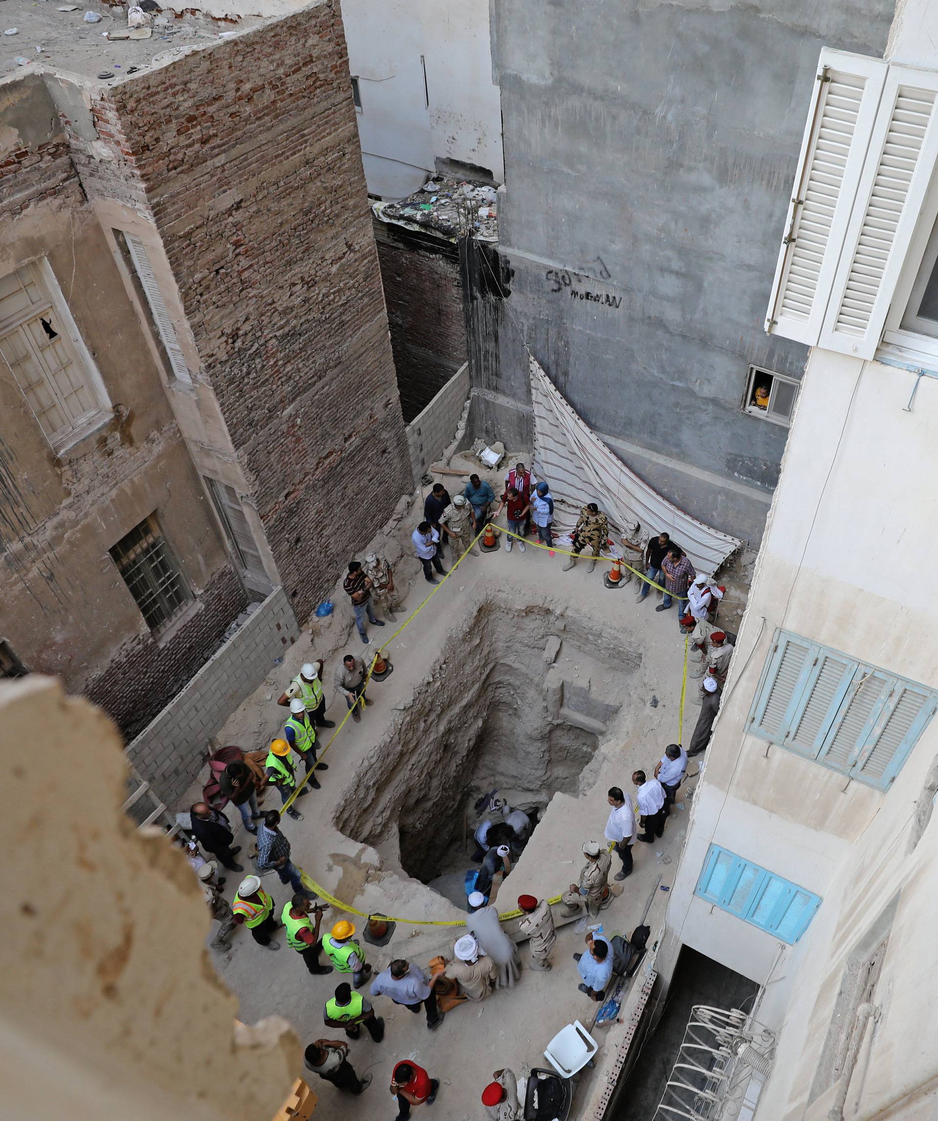 General view of residential area where a coffin containing three mummies was discovered in Alexandria
