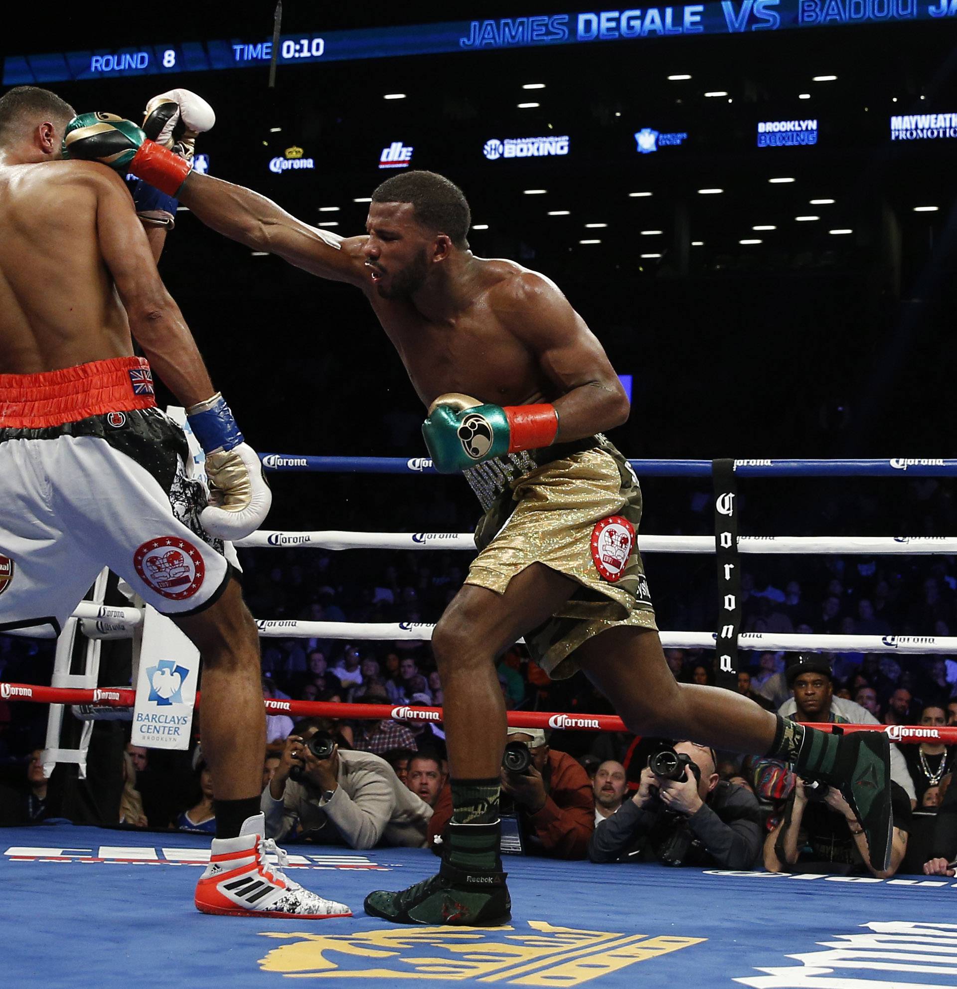 James DeGale in action against Badou Jack. An object is seen on the ring floor during the fight. According to reports,DeGale lost a tooth during the match