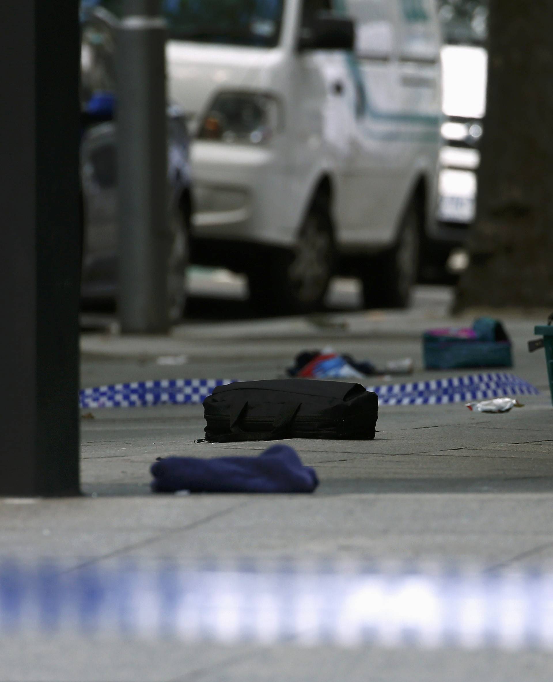 Belongings lie scattered on a footpath after police cordoned off Bourke Street mall, after a car hit pedestrians in central Melbourne