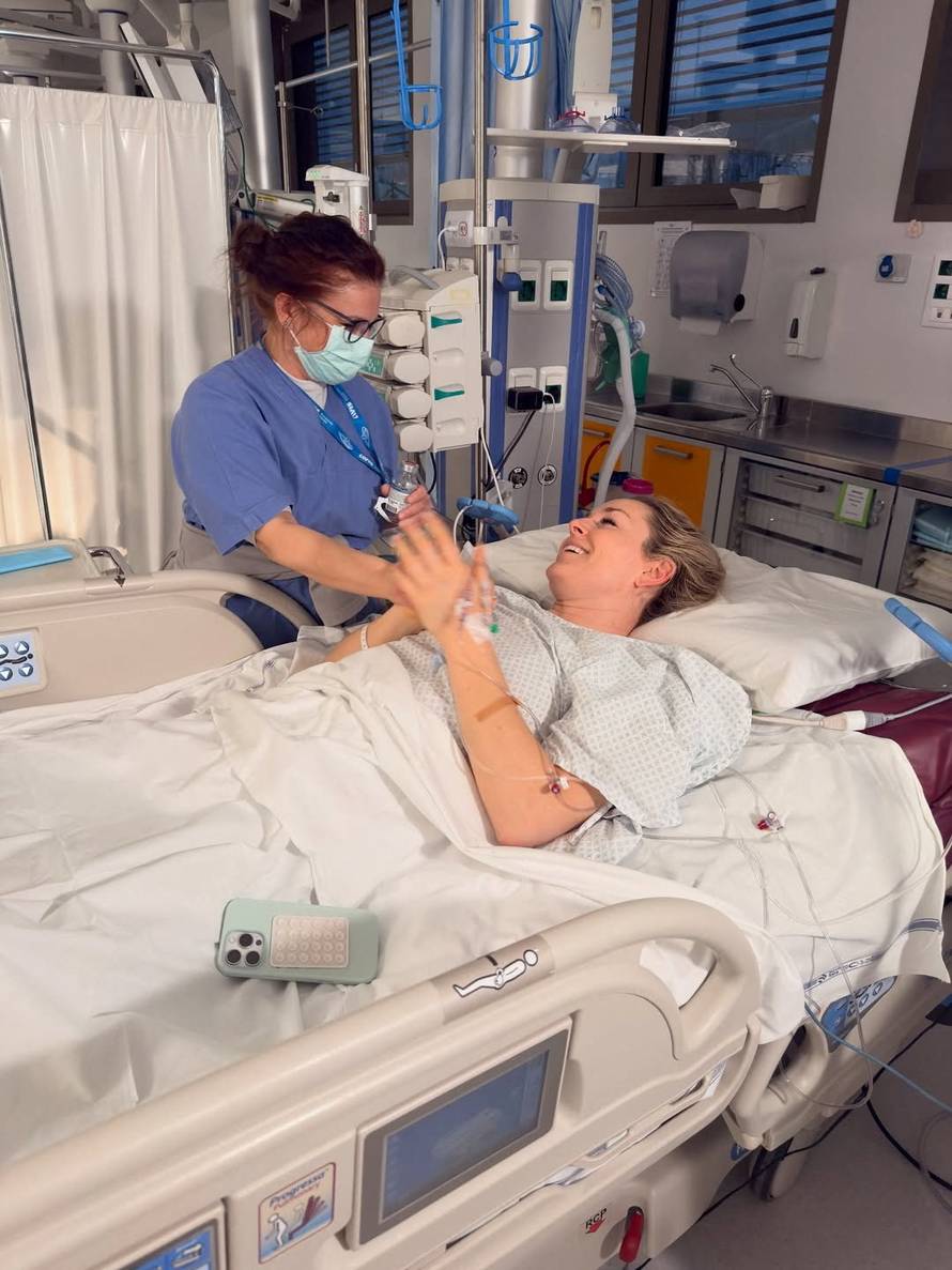 U.S. skier Lindsey Vonn lies in a hospital bed, after she crashed during the Women's Downhill, in Treviso