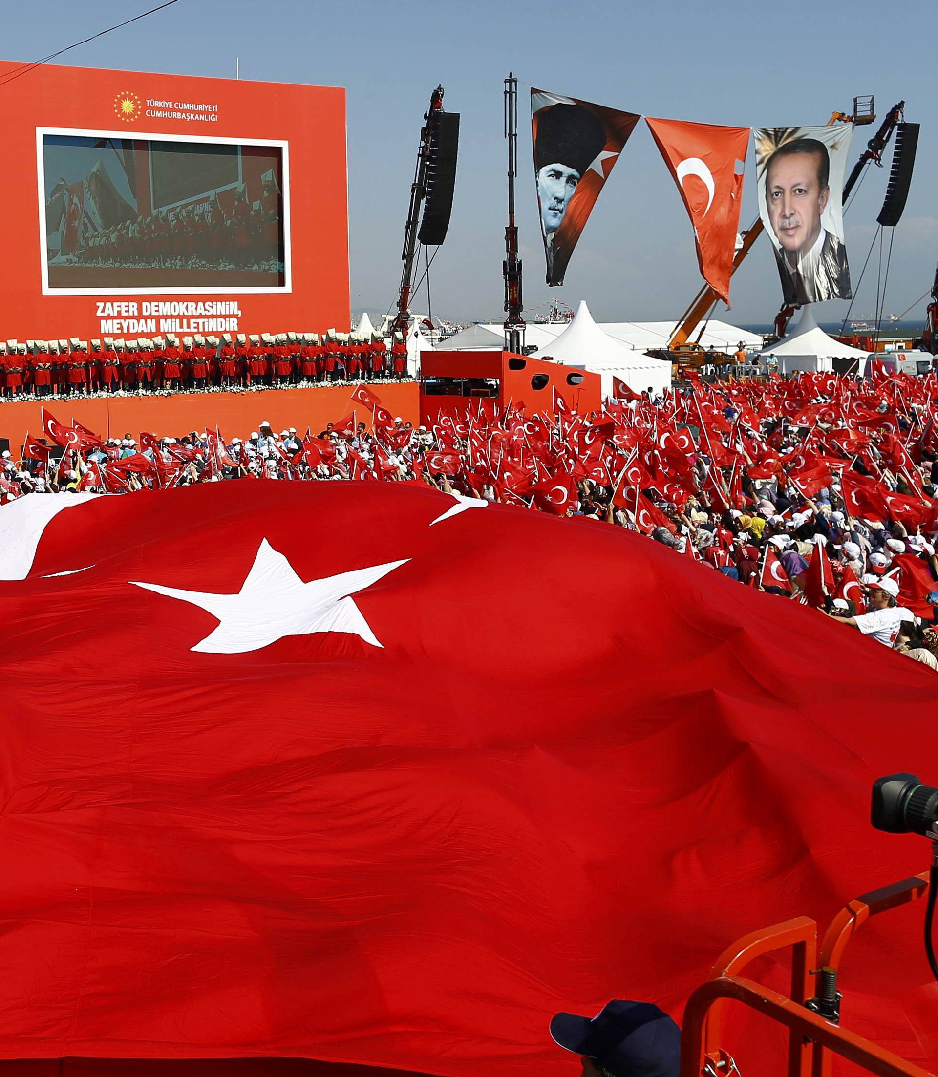 A giant Turkey's national flag is seen during the Democracy and Martyrs Rally in Istanbul