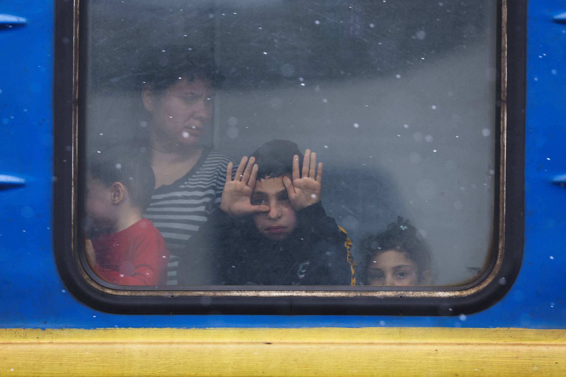 Refugees flee Russia's invasion of Ukraine, in Lviv