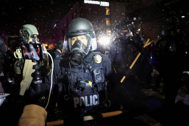Protest outside the hotel where Bovino, who has been removed from his role, is reportedly staying, in Maple Grove