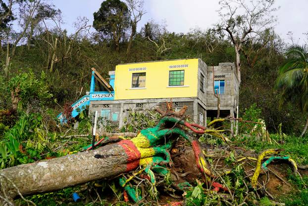 Damaged house missing its roof after Hurricane Beryl passed Grenada