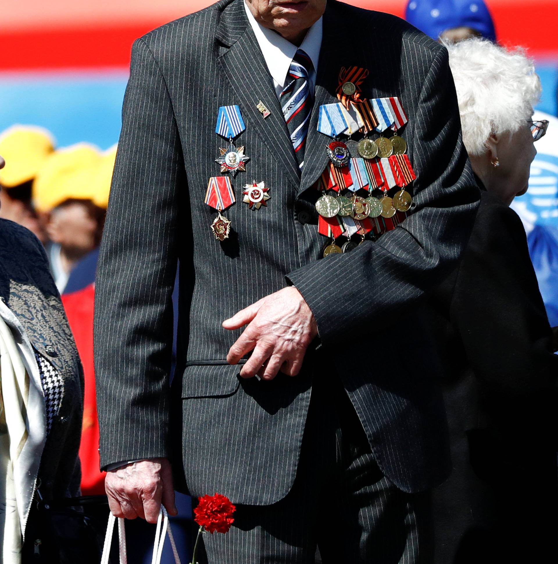 Veterans attend the Victory Day parade at the Red Square in Moscow