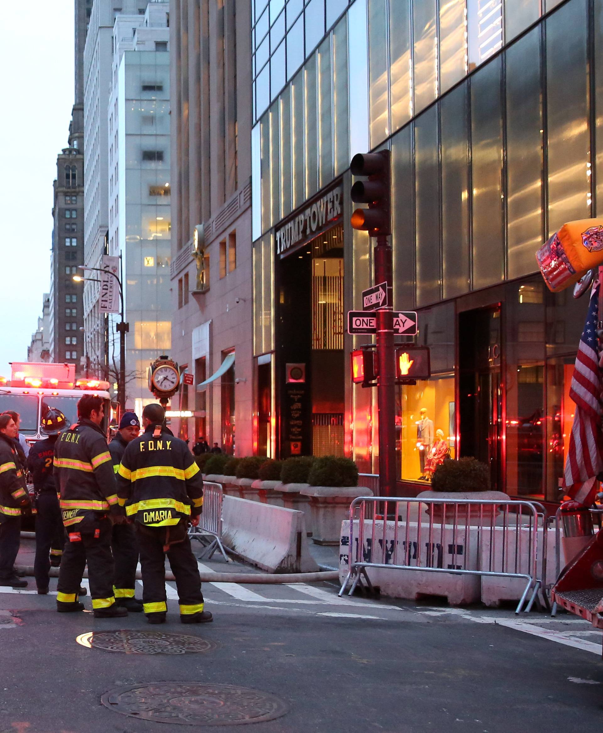 First responders work on a fire in a residential unit at Trump tower in the Manhattan borough of New York City