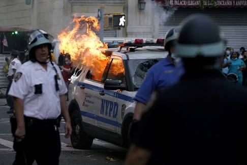 Protesters rally against the death in Minneapolis police custody of Floyd, in the Brooklyn borough of New York City