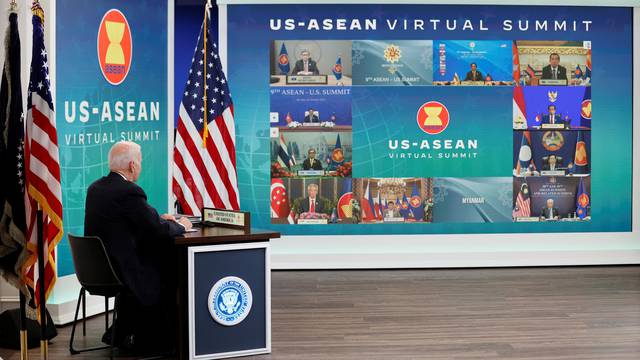 U.S. President Biden participates virtually with the ASEAN summit from an auditorium at the White House in Washington