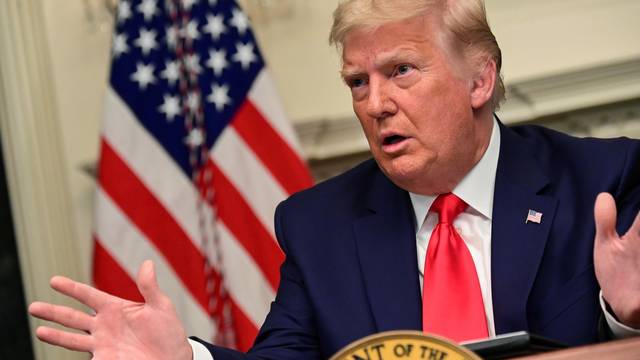 U.S. President Donald Trump participates in a Thanksgiving video teleconference with members of the military forces