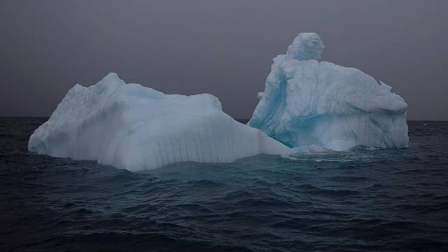 FILE PHOTO: An iceberg floats near Two Hummock Island, Antarctica