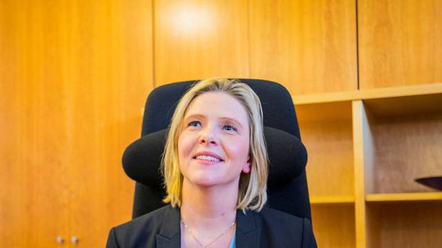 Sylvi Listhaug sits at the desk after she was introduced as the new Senior and Public Health Minister, in Oslo