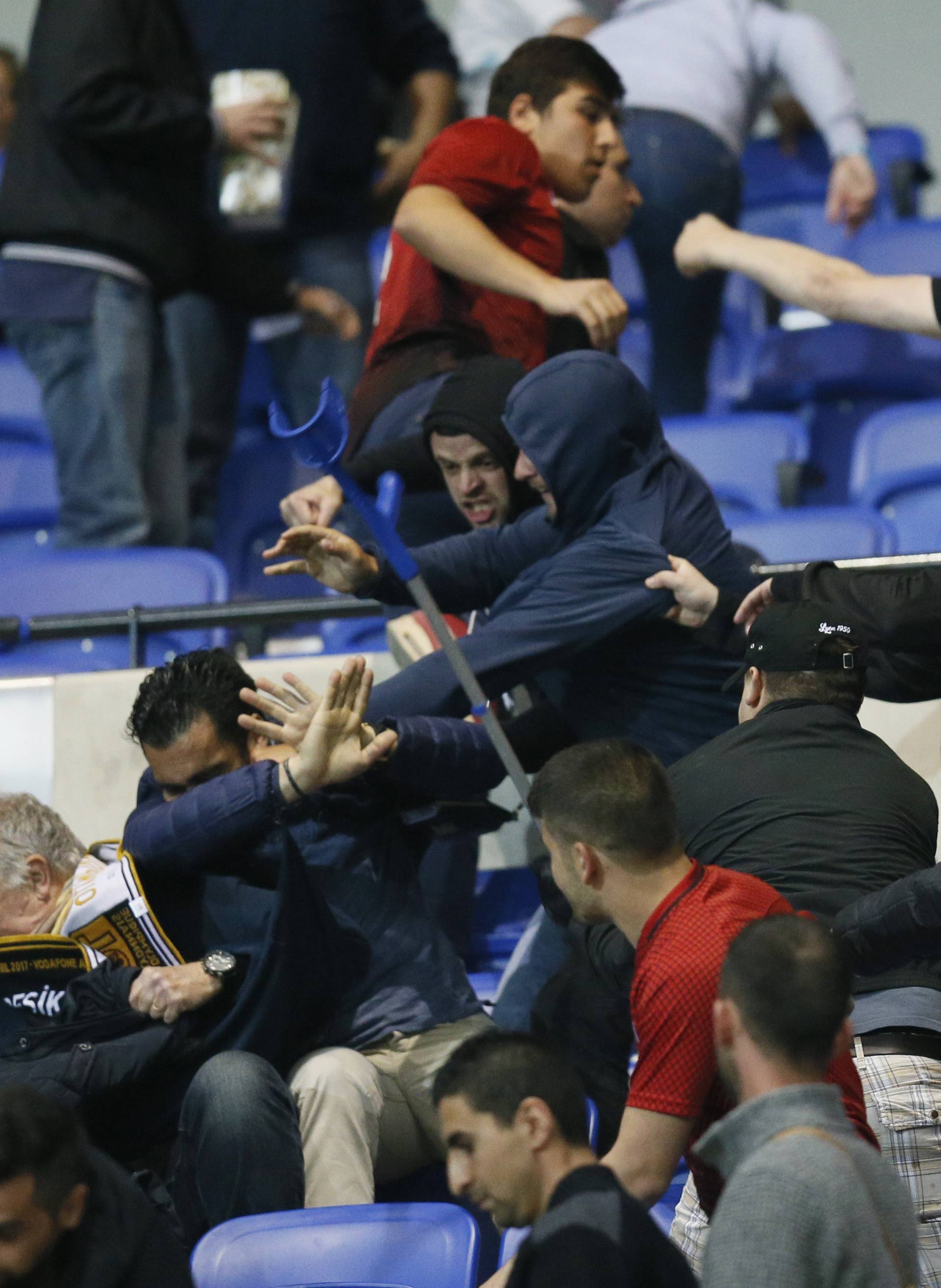 Besiktas and Lyon fans clash in the stands