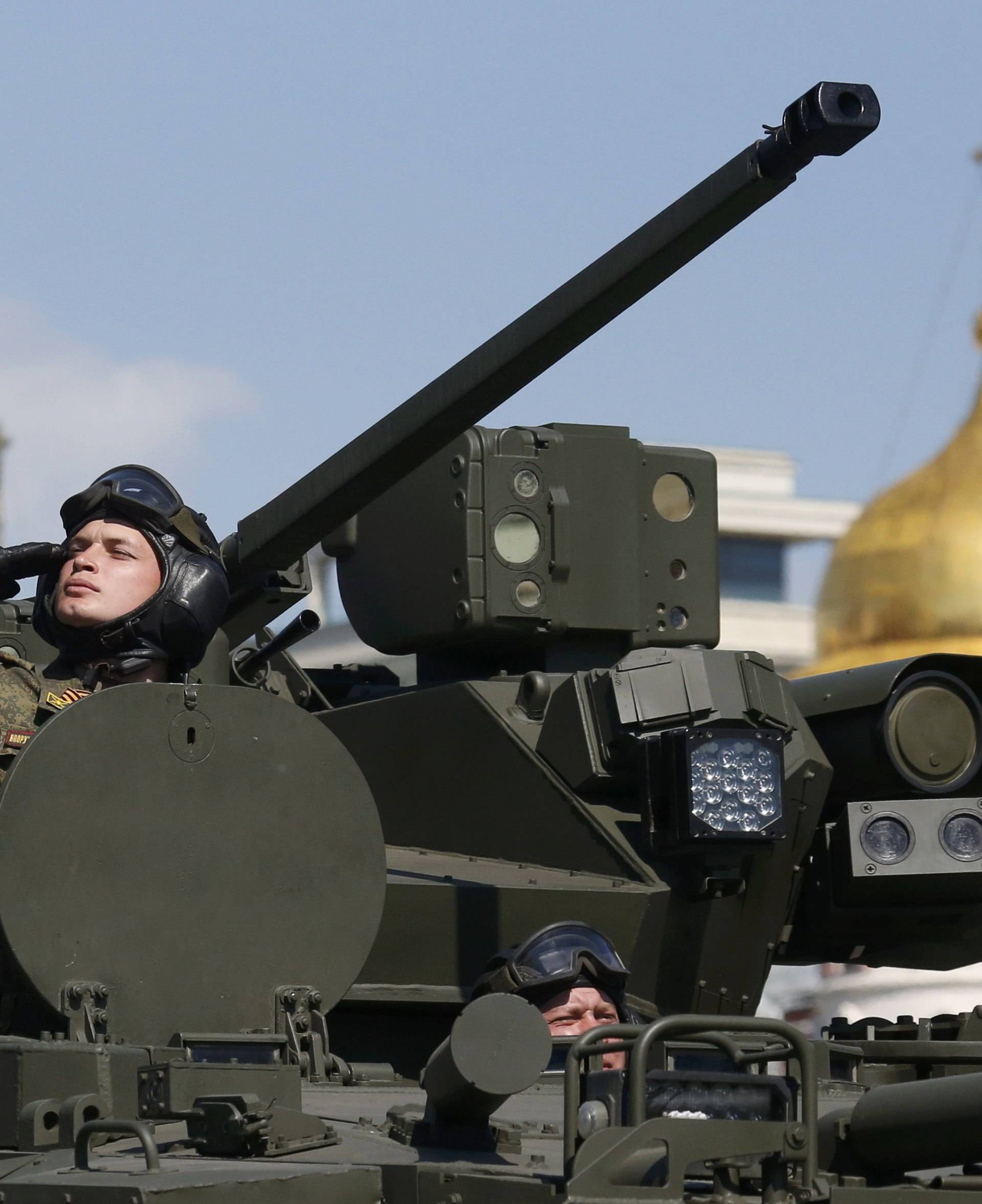 Russian servicemen drive Kurganets-25 armoured personnel carrier during Victory Day parade to mark end of World War Two at Red Square in Moscow