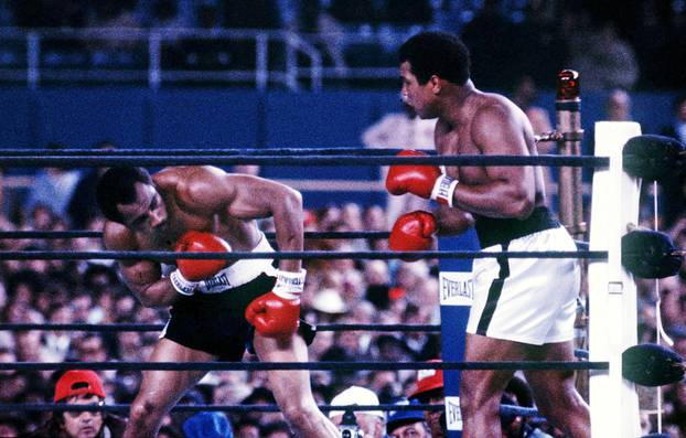 Muhammad Ali (R) fights Ken Norton at Yankee Stadium in the third fight between the two heavyweights in New York City