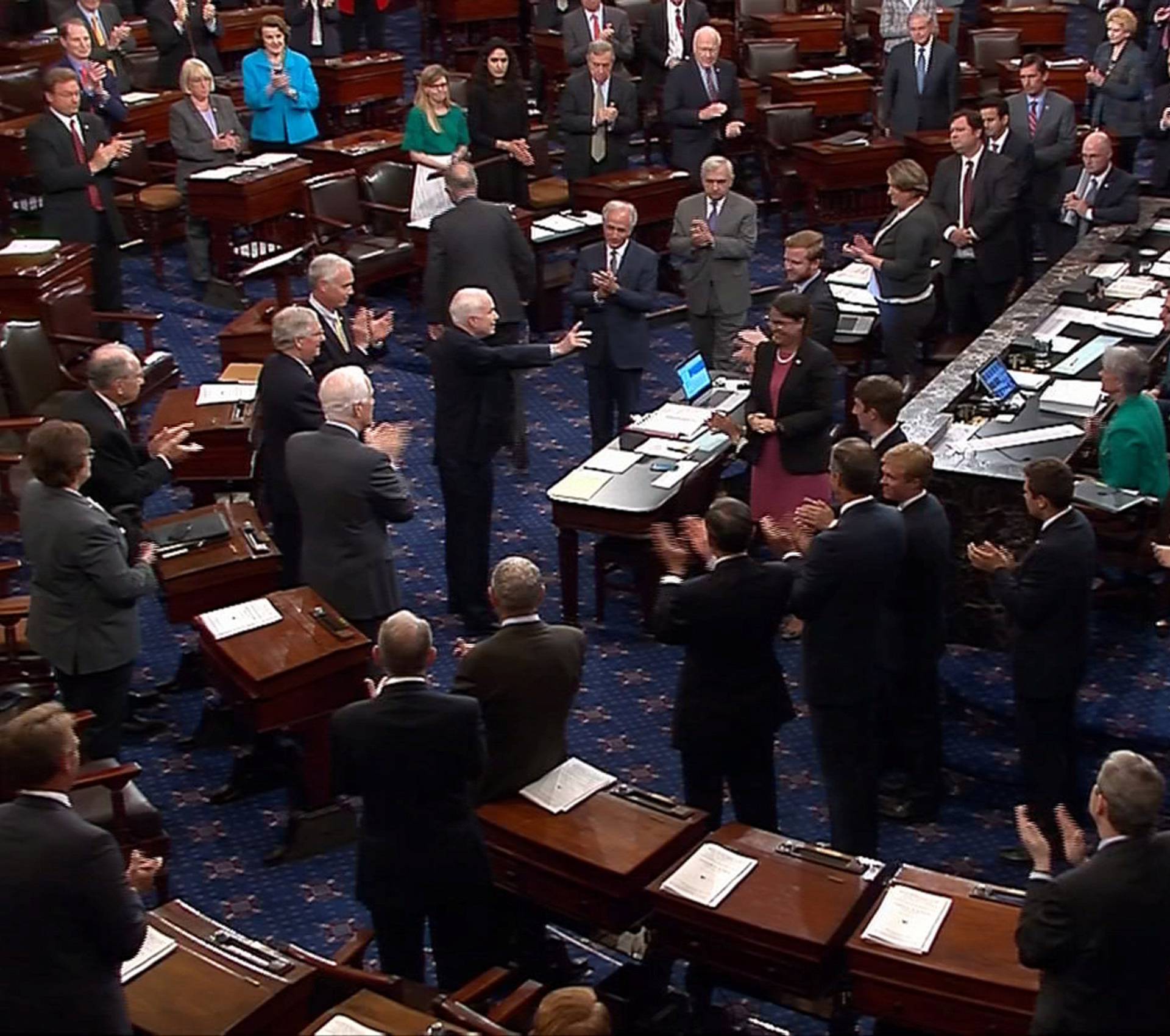 Still image from video shows U.S. Senator McCain arriving on the floor of the U.S. Senate for a vote on healthcare reform in Washington
