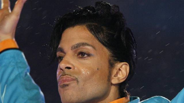 Prince performs during halftime show of the NFL's Super Bowl XLI football game between the Colts and the Bears in Miami