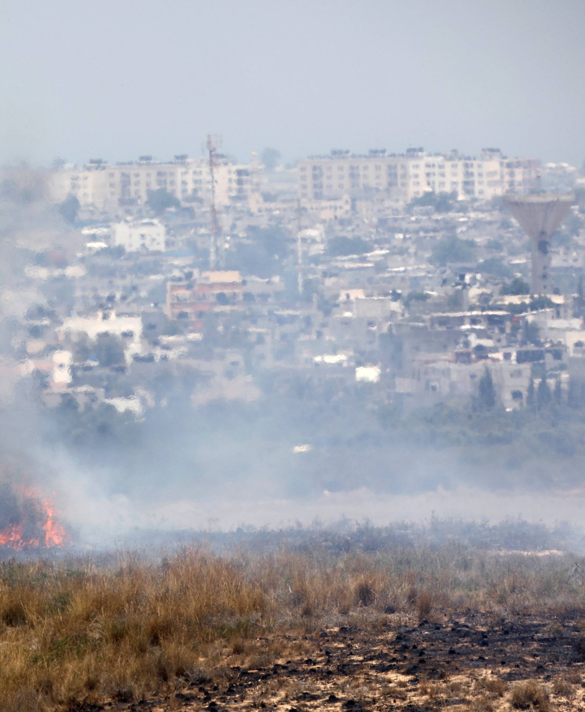 A fire burns in scrubland in Israel near the Gaza Strip, in an area where Palestinians have been causing blazes by flying kites and balloons loaded with flammable material across the border