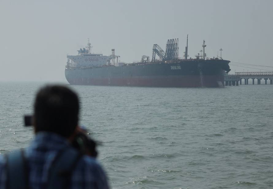 The Liberia-flagged tanker Shenlong Suezmax, loaded with Saudi Arabian crude, arrives at a port after transiting the Strait of Hormuz amid supply disruptions linked to the U.S-Israeli conflict with Iran, in Mumbai